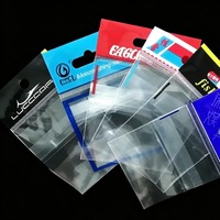 Sachet plastique OPP transparent auto-adhésif à chargement par le haut avec carte arrière en papier pour leurres de pêche, jigheads et hameçons