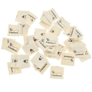 Etiquetas de Tela de Marca de Diseño Nuevo al por Mayor, Etiquetas Colgantes <span class=keywords><strong>para</strong></span> <span class=keywords><strong>Ropa</strong></span>, Etiquetas Tejidas <span class=keywords><strong>para</strong></span> el Cuidado del Cuello <span class=keywords><strong>para</strong></span> Mujer, Diseño de Accesorios de <span class=keywords><strong>Ropa</strong></span> - Product Image 1