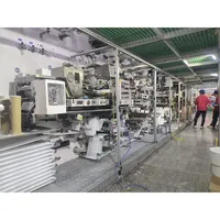 Machine de fabrication de culottes menstruelles pour adultes entièrement automatique d'occasion, machine de fabrication de couches pour femmes