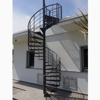 Escalier en spirale moderne en acier inoxydable avec garde-corps en fer forgé, kit modulaire pour usage intérieur