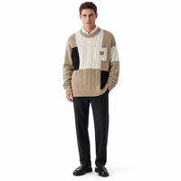 Pull en maille torsadée patchwork 12GG en laine et acrylique pour homme, col rond, anti-boulochage, hiver, échantillon rapide, usine source OEM personnalisée