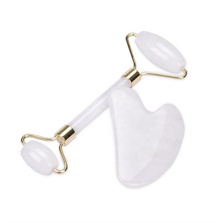 white jade roller and heart shape gua sha