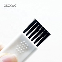 Brosse à clavier en plastique conception antidérapante 10 couleurs rasoir fissure mini brosse porte-clés accessoires gadget rasoir haut-parleur