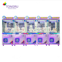 Machines de jeux d'arcade colorées à pièces/griffe de grue de jouet à vendre/distributeur automatique de jouets/variété personnalisée de jouets