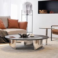 Grande table centrale design avec structure en acier inoxydable pour hôtel et salon