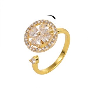 Vente en gros d'anneau rotatif de moulin à vent à quatre feuilles en cuivre à la mode or roue universelle ouverture blanche bague de doigt de décompression - Product Image 5