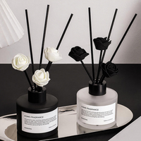 Diffuseur de parfum sans flamme en verre rond noir mat de 100 ml pour la décoration de la maison, avec des bâtonnets fins parfumés en forme de rose