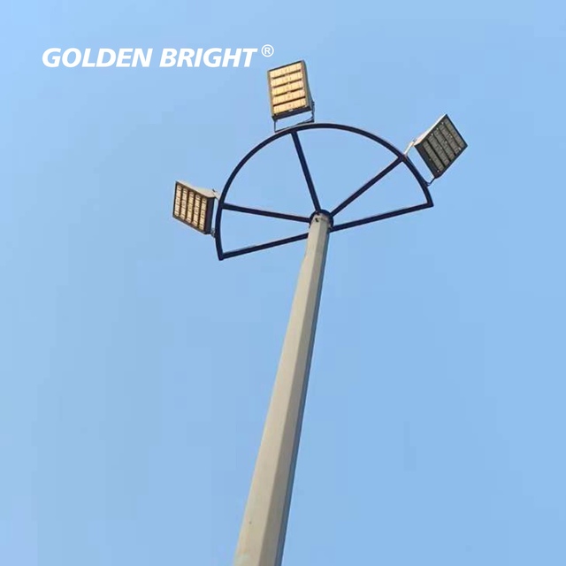 Golden Bright Floodlight Octagonal Tapered Steel Pole 6M-18M for Wide-area Illumination