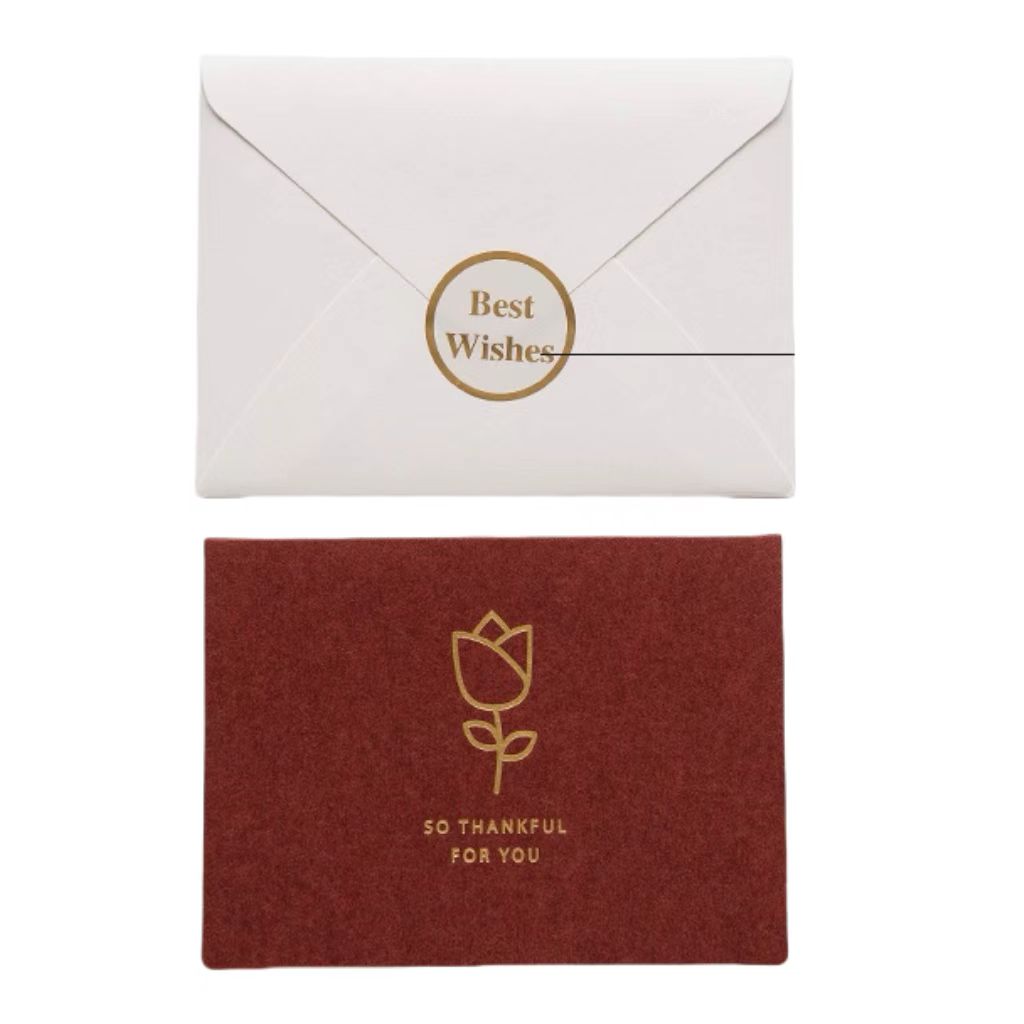 E 1 carte de vœux + 1 enveloppe + 1 autocollant /ensemble