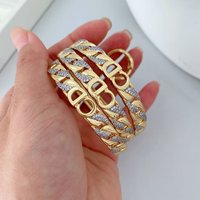 Ensemble de bracelets tendance avec chaîne cubaine, quatre fleurs et zircone, plaqué cuivre or 18 carats, style empilable, vente en gros