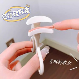 Recourbe-cils style clip blanc grand angle avec coussinet en silicone remplaçable pour usage général - Product Image 1