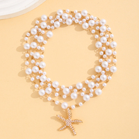 Collier élégant pour femme, chaîne multi-brins en fausses perles avec pendentif étoile de mer dorée en alliage, cadeau de fête