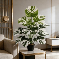 Plante artificielle Monstera avec de grandes feuilles artificielles de Monstera, verdure tropicale réaliste pour la décoration intérieure