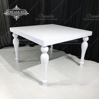 Table de salle à manger moderne d'extérieur en fer peint blanc avec plateau en MDF, durable, de la marque Dreamlike, idéale pour les mariages, événements et hôtels