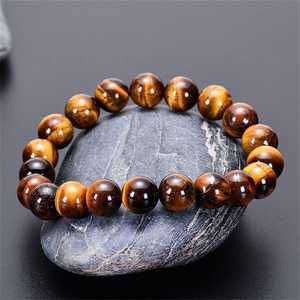 NOBLESTONE GEMS สร้อยข้อมือลูกปัดหินไทเกอร์อายธรรมชาติ ขัดเงา ทรงกลม สายยืดได้ เครื่องประดับสำหรับทุกเพศ เหมาะสำหรับสวมใส่ทุกวัน - Product Image 1