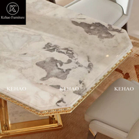 Ensemble de table à manger rectangulaire en marbre de luxe avec base en marbre à bordure dorée, chaises rembourrées, style moderne pour villa