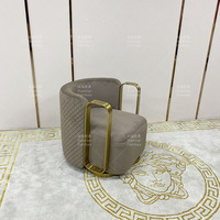 Fauteuil pivotant moderne en tissu velours avec structure en métal doré, design luxueux pour chambre à coucher, hôtel et salon
