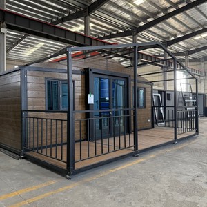 Maison conteneur extensible Sunfine à 2 chambres, design moderne, caractéristique respirante, construction préfabriquée, salon avec patio - Product Image 1