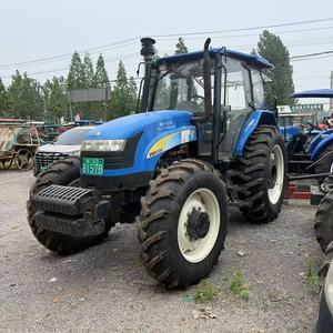 Trattore Agricolo Gommato New Holland 1304 Usato in Buone Condizioni con Motore da 130 CV e Contrappeso Anteriore a Prezzo Vantaggioso - Product Image 1