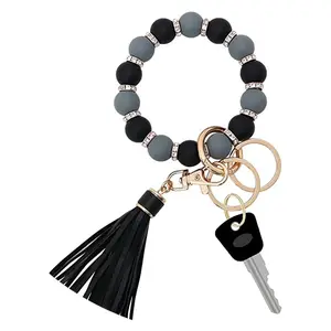 Großhandel neuer Silikon Schlüsselanhänger Armband Perlen-Armband Schlüsselanhänger Silikon Perlen-Armband Tassel Schlüsselanhänger Boho Holz Metall