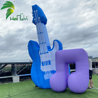 Ballon publicitaire gonflable personnalisé Hongyi 2026 en bâche PVC, modèle guitare musicale avec logo LED