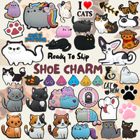 Offre Spéciale Kawaii animal de compagnie sabot diapositives breloques PVC caoutchouc extérieur bibelot lacets pince caca chaton patte chat chaussures boucles en vrac