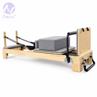Machine de Pilates Reformer en érable blanc de qualité supérieure avec système de poulies silencieux de qualité commerciale, personnalisable avec logo, pour salles de sport, studios à domicile et usage professionnel
