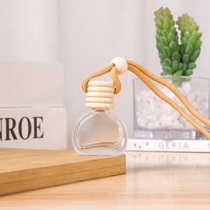 Bottiglia di profumo per Auto con tappo in legno diffusore deodorante appeso vetro vuoto ricaricabile per Auto ciondolo odore olio essenziale - Product Image 5