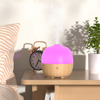 Diffuseur d'arôme d'huile essentielle à ultrasons de mini conception populaire humidificateur d'air d'aromathérapie à lumière LED 7 couleurs changeantes