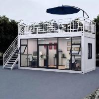 Profitez d'un design personnalisé avec notre maison conteneur à montage rapide avec panneau mural créatif pour serre ou camping en plein air