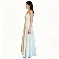 Robe longue beige élégante pour femme, bretelles spaghetti, buste à volants, nouée sur le devant, jupe évasée, idéale pour l'été, la plage ou les invitées de mariage