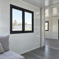 Villa duplex moderne préfabriquée de luxe à deux étages en conteneurs avec escalier intérieur pour habitation