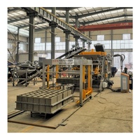Machine de fabrication de briques creuses en béton Qt12-15 de haute qualité, machine hydraulique entièrement automatique pour la fabrication de blocs creux en ciment