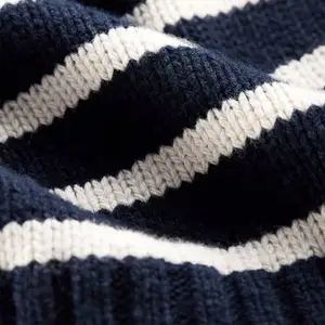 Suéter de marca famosa para mujer, suéter de manga larga con cuello en V, rayas de contraste de color personalizado de fábrica, versátil e informal