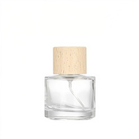 Flacons de parfum miniatures de luxe personnalisés 30ml 100ml, flacons de parfum vides en vrac, flacons de parfum en verre de luxe 30ml 50ml avec vaporisateur et bouchons uniques