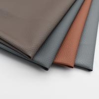 Tissu en cuir synthétique PVC Rexine en gros, similicuir végétalien Litchi Lychee pour la décoration intérieure, la sellerie de sièges de voiture