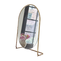 Vente en gros vanité de table élégante et moderne luxe miroir de maquillage ovale cosmétique en métal doré décoration pour la chambre à coucher