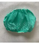 病院の実験室で使用するためのタイヤパターンオーバープリント付きの使い捨て不織布グリーン滑り止めシューズ