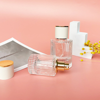 Nuevo Estilo Botella de Perfume de Vidrio de Lujo de 30ml con Forma de Cilindro y Frasco de Vidrio Transparente con Atomizador de 50ml