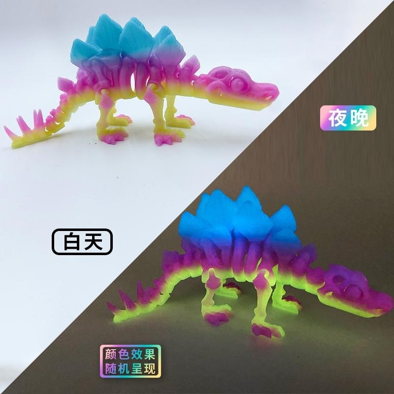 Estegosaurio luminoso de colores de 18 cm de largo.