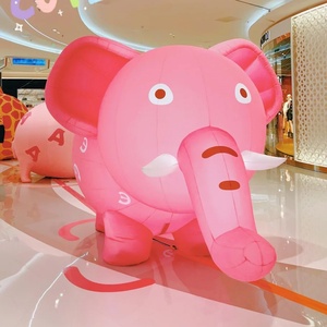 Éléphant gonflable géant rose pâle et doux avec des dents amicales, conçu pour les centres commerciaux, les musées et les espaces de divertissement familial - Product Image 1