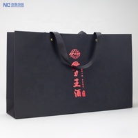 Sacs en papier gaufré sérigraphie avec emballage personnalisé Sac en papier cadeau pour l'épicerie en tissu pour chaussures