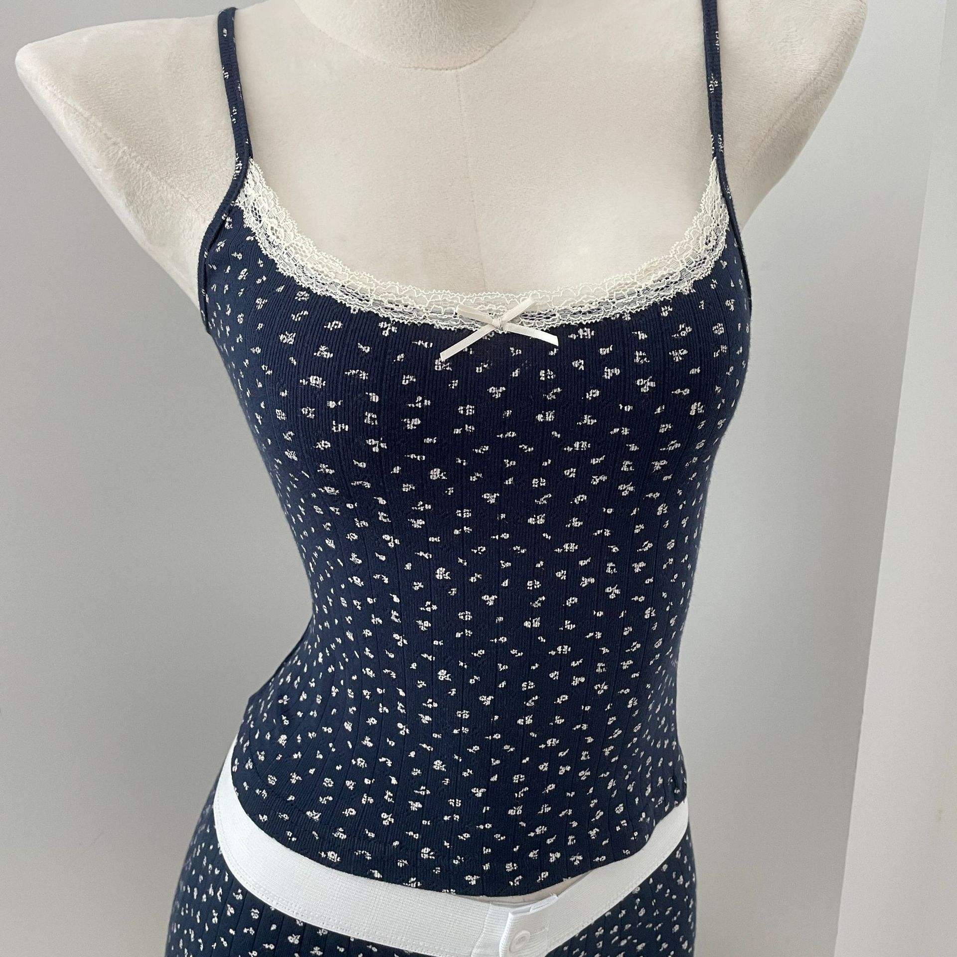 Navy blue bottom with white flower --vest