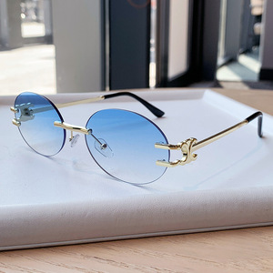 Gafas de Sol Ovaladas sin Montura, Lentes Azules Degradados, Protección UV400, Estilo Y2K, Unisex, Protección Solar para Adultos - Product Image 1