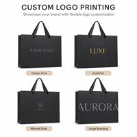 Sacs en papier personnalisés haut de gamme noirs pour le shopping, sacs d'emballage pour costumes, adaptés aux magasins de vêtements et aux cadeaux, sacs fourre-tout