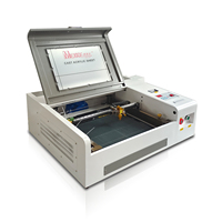 Petite machine portable de découpe et de gravure laser Co2 Machine de gravure de timbres Machine de gravure laser sur bois