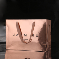 Embalaje de ropa de compras de Boutique, Asa de cinta de lujo, impresión personalizada, bolsas de regalo de papel europeo con logotipo