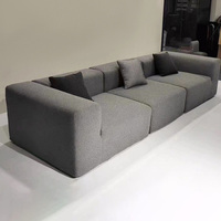Canapé sectionnel moderne en tissu, trois places, design modulaire, dossier lâche, accoudoirs droits, mobilier de salon, couleur grise