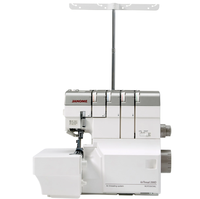 Machine à coudre industrielle à lit plat Janome AirThread 2000D avec enfilage automatique, moteur et point surjet pour une efficacité accrue