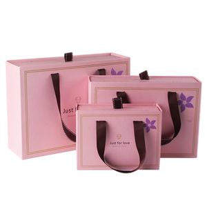 Venta al por mayor de alta calidad de logotipo de diseño personalizado bolsa de embalaje de regalo de papel con asas para regalo - Product Image 4